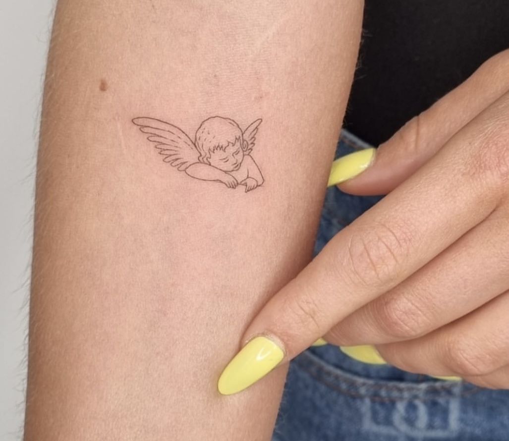 reinostorm on Instagram | Cherub tattoo, Funky tattoos, Angel tattoo for  women