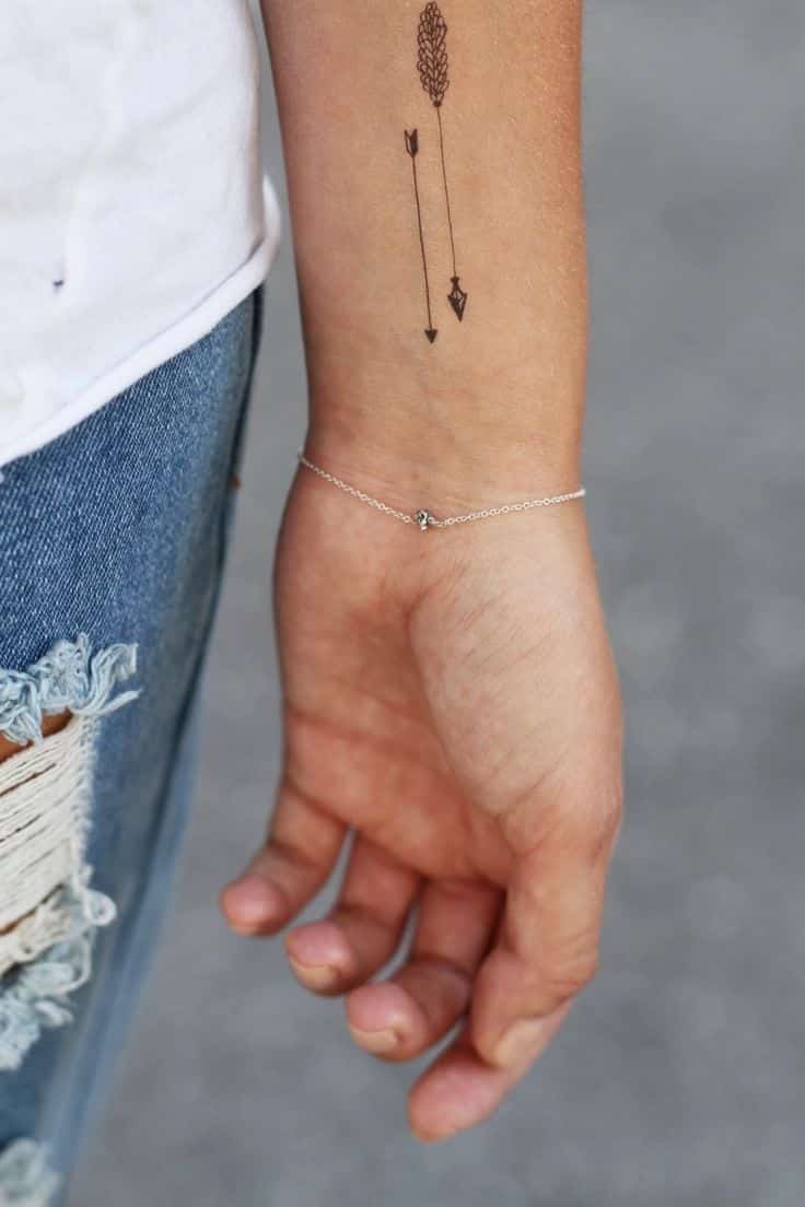 Minimalist Arrow Tattoo on the Wrist