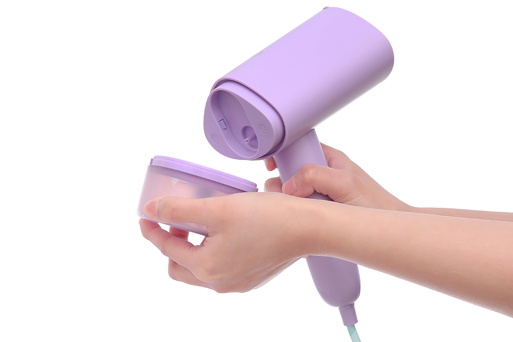 Bình nước của bàn ủi cầm tay Philips STH3010/30 có thể tháo rời để vệ sinh