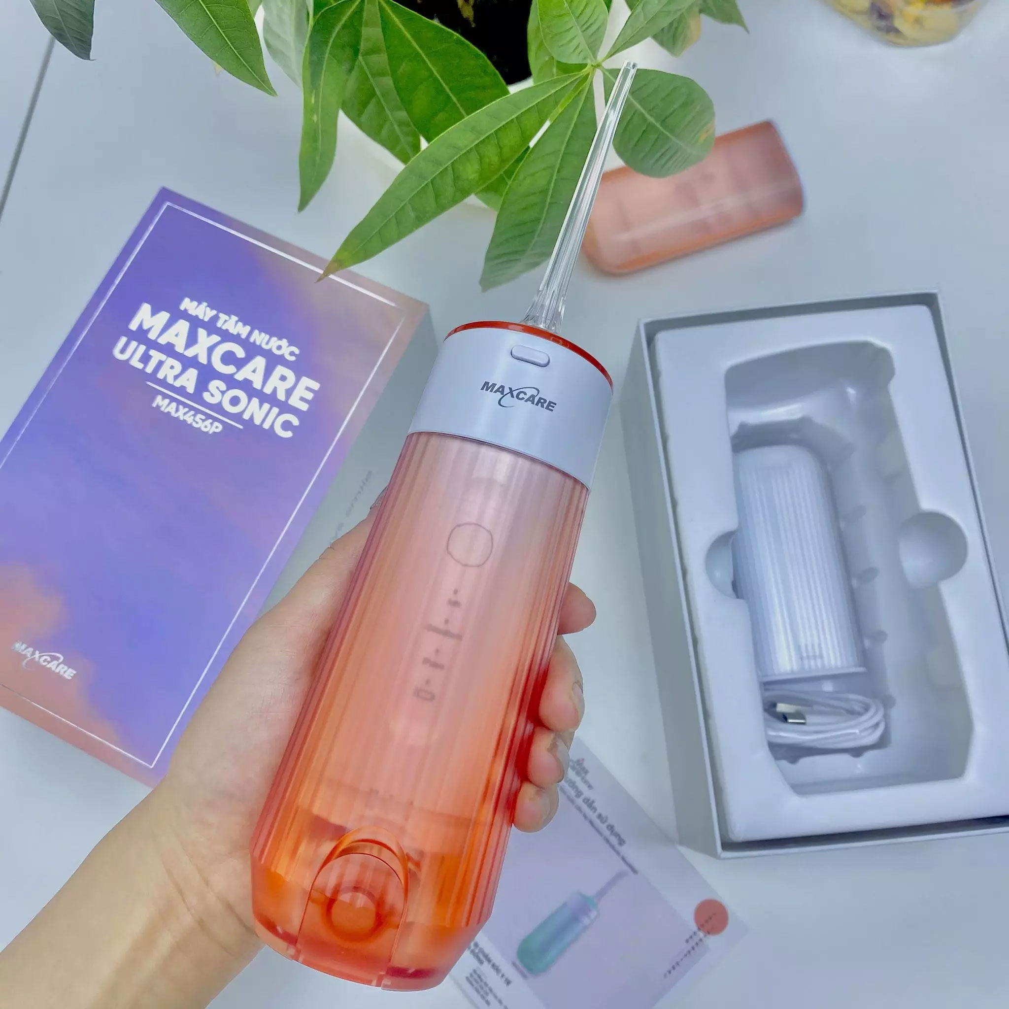 Máy tăm nước có 2 đầu tăm